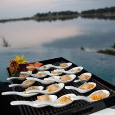 Butternut Squash Ravioli served in an Asian Spoon with Sage-Brown Butter Sauce Old square